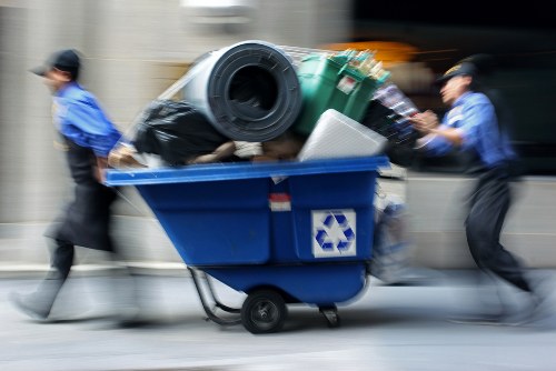 Workers handling construction debris